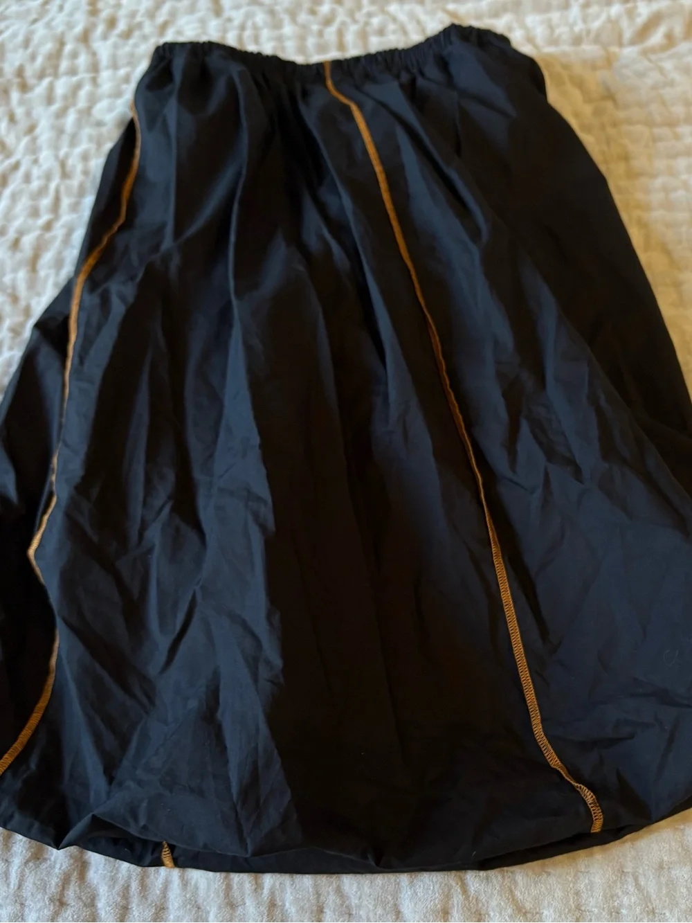 BASERANGE The Turn Skirt In Black Organic Cotton Contrast Stitch Twisted Seams